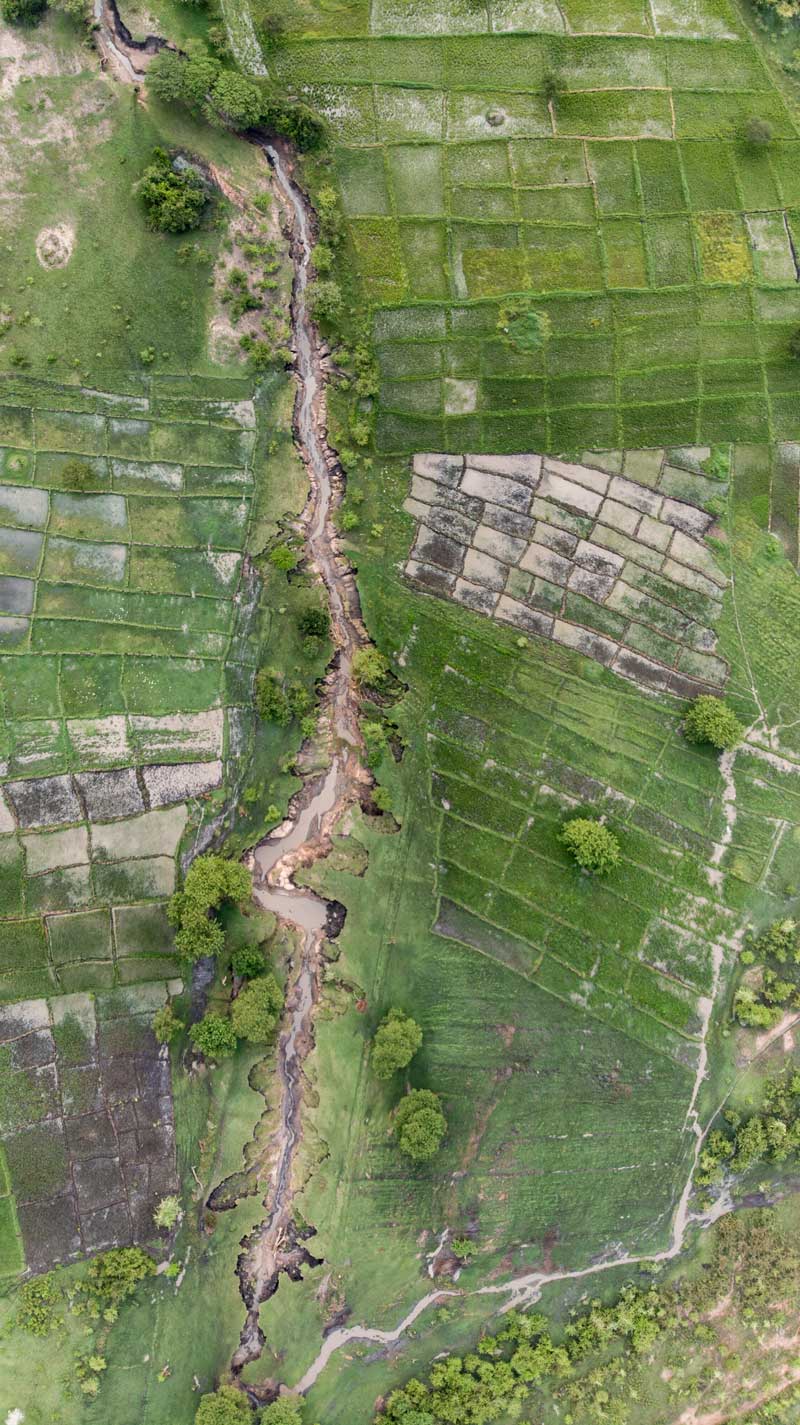 Drone shot of the corridor that separates wilderness areas and community areas in the Serengeti.